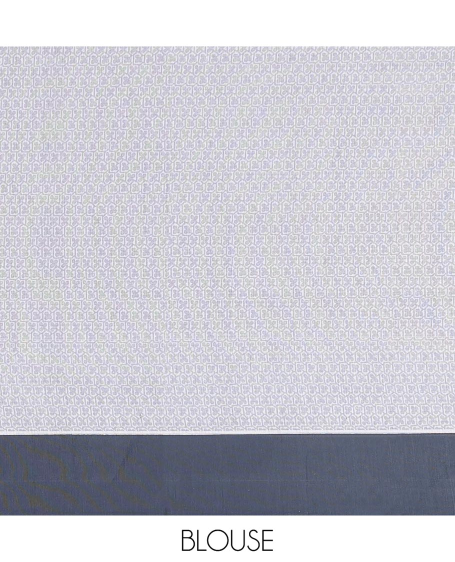 White Semi-Silk Cotton Saree, Sparsely Woven with Buttas and Floral Designs All Over Its Body, Complemented by Contrast Border, Sparsely Woven Pallu of Floral Jaal Designs, and Paired with a Matching Blouse