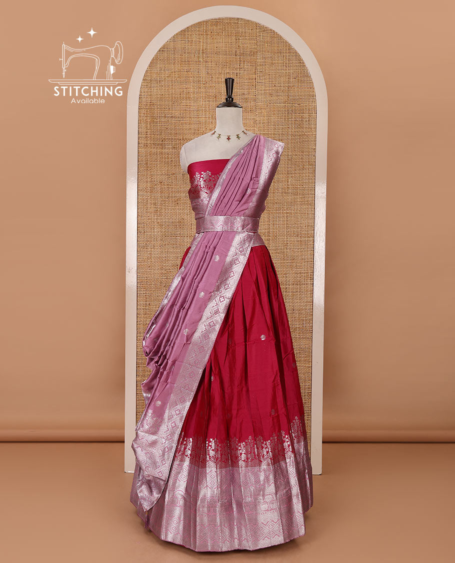 Rani pink taffeta silk half-saree, zari buttas & contrast floral-geometric zari border skirt, zari woven blouse & contrast zari woven dhavani