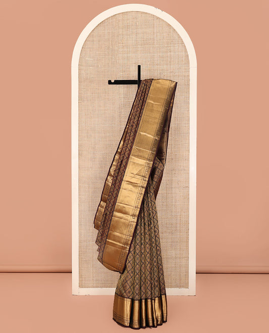 Brown Kanchipuram Wedding Silk Saree, Decked Up with Jacquard Design On Its Body, Highlighted by Zari Border of Rekku, Mayil and Chakram Designs, Grand Jaal Pallu and Paired with a Matching Blouse