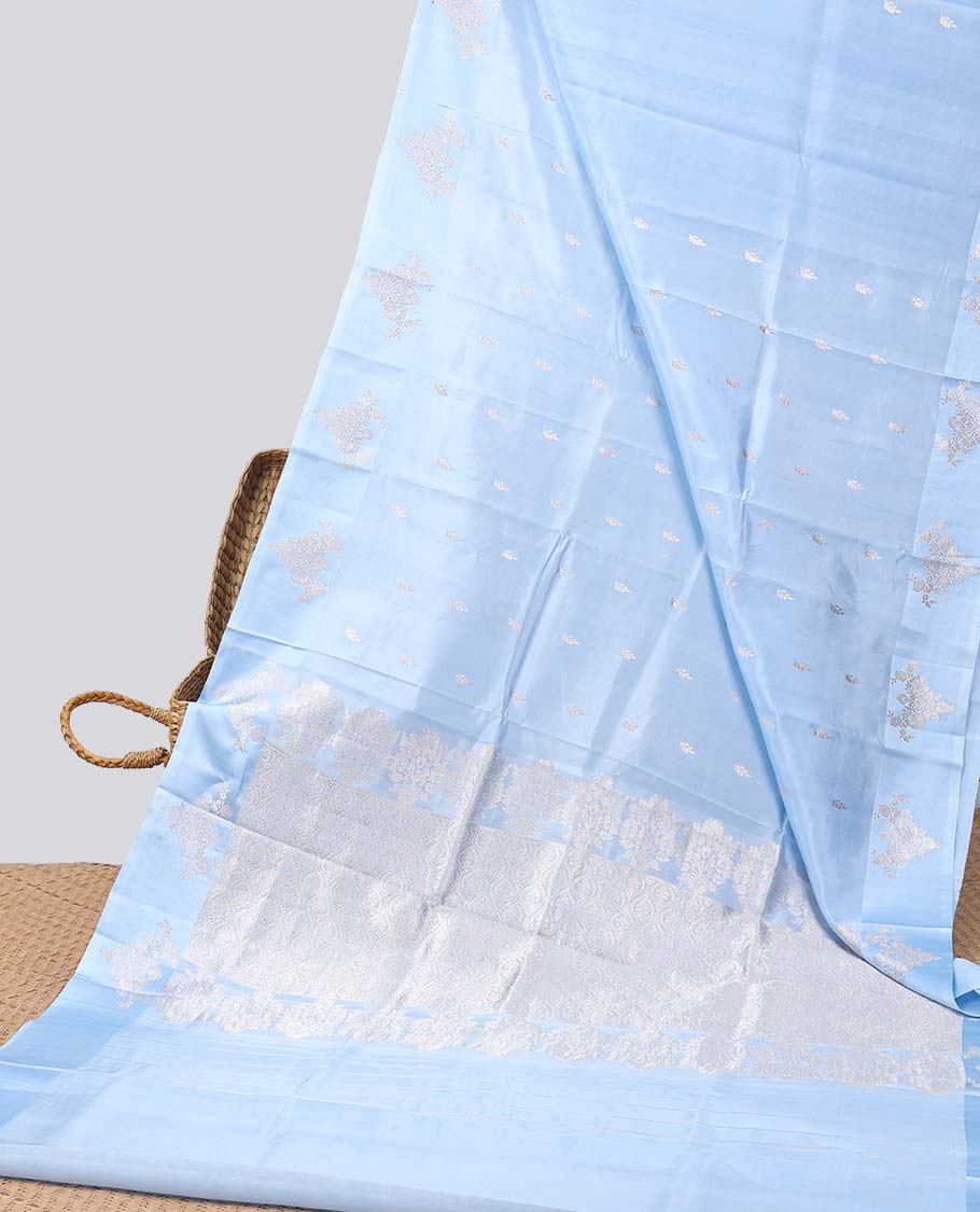 Blue floral buttas raw mango silk saree with self floral border & jaal zari design pallu