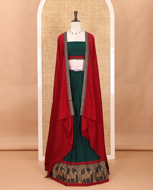 Green with maroon mercedised cotton half-saree, contrast elephant zari border skirt, matching blouse & one side border georgette dhavani