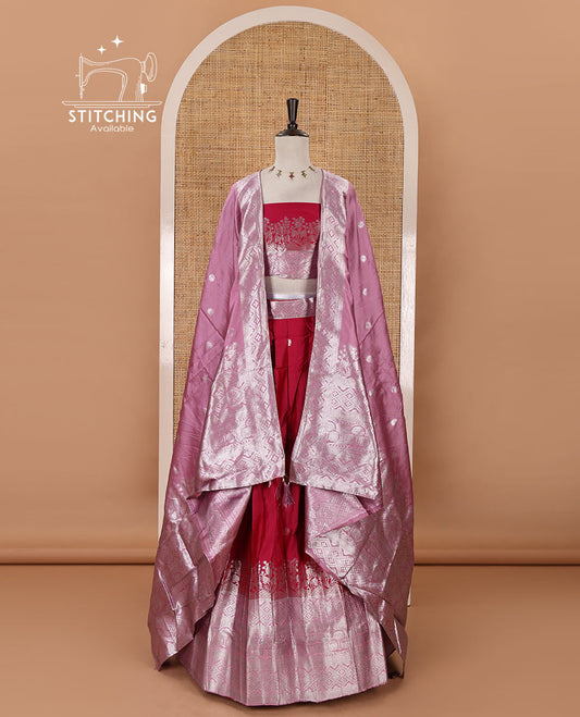 Rani pink taffeta silk half-saree, zari buttas & contrast floral-geometric zari border skirt, zari woven blouse & contrast zari woven dhavani