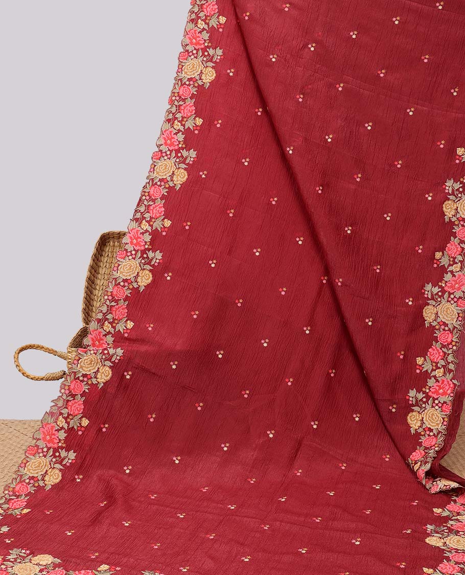 Maroon crushed tissue saree with all over floral motifs & floral scallop border