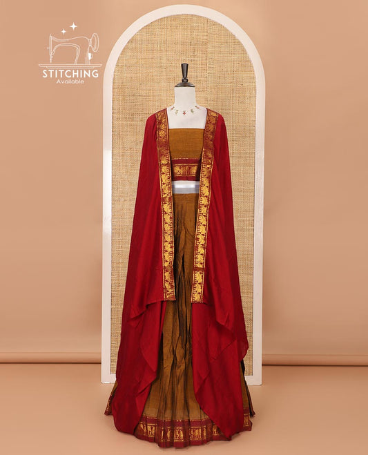 Mustard mercedised cotton half-saree, plain contrast elephant zari border skirt, matching blouse & contrast maroon zari elephant border dhavani