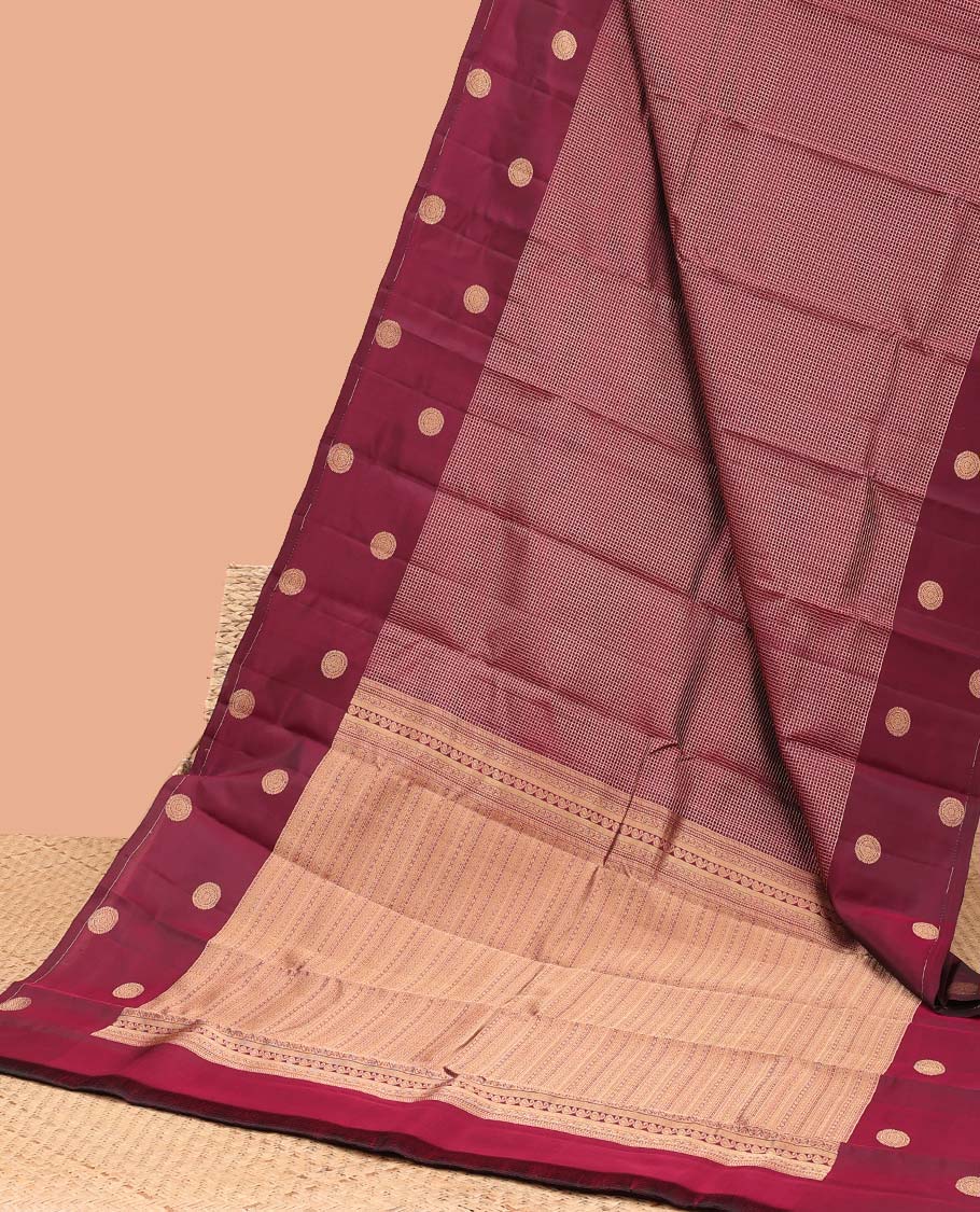 maroon checked vasundhara elite silk saree with self round buttas border & intricate zari design pallu