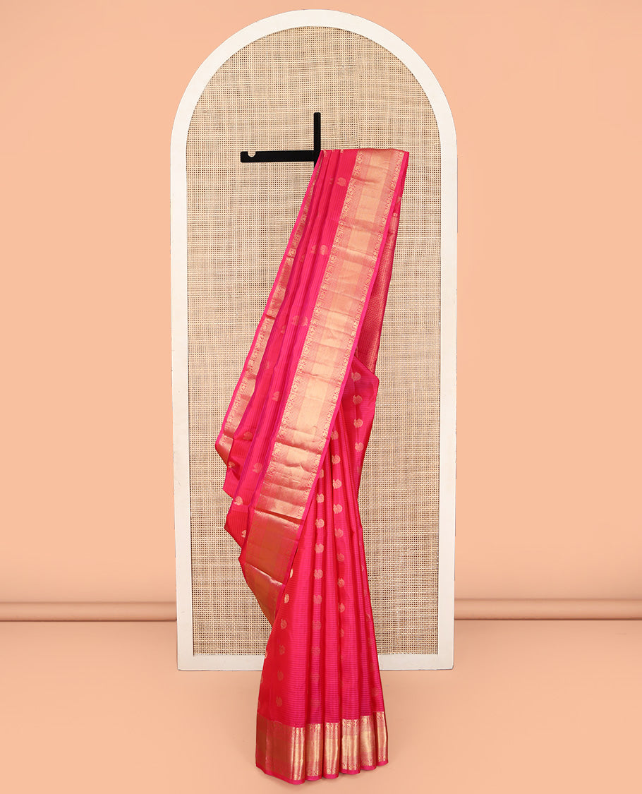 Pink Kanchipuram Silk Saree, Adorned with Mayil Buttas on Its Body, Highlighted by a Zari Border of Rekku, Mayil, Yaanai, and Mayil Kann Designs, Grand Pallu of Chevron Designs, and Paired with a Matching Blouse