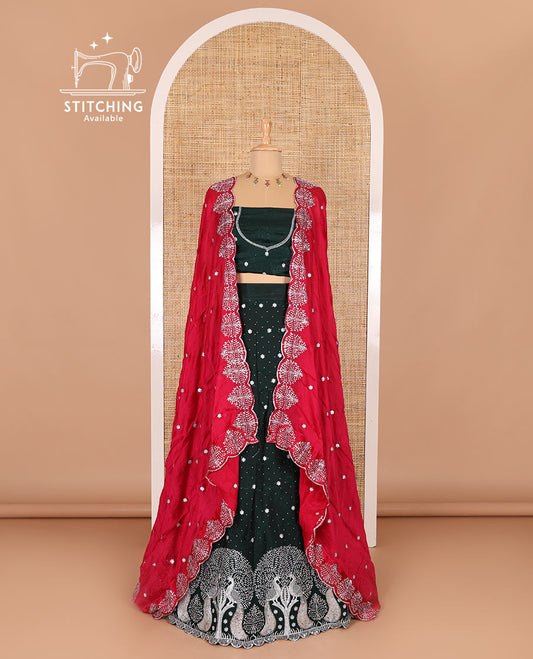 Dark green half-saree, buttas, tree, and peacock motifs embroidered semi-taffeta silk top, matching blouse, and contrast scallop embroidered dhavani