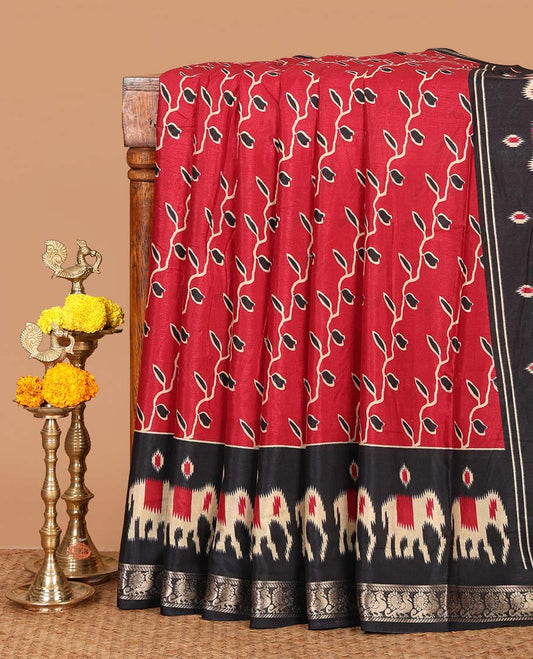 Red floral vine printed Assam cotton saree,contrast border of ikat elephant print & zari peacocks,ikat jaal pallu & ikat print blouse