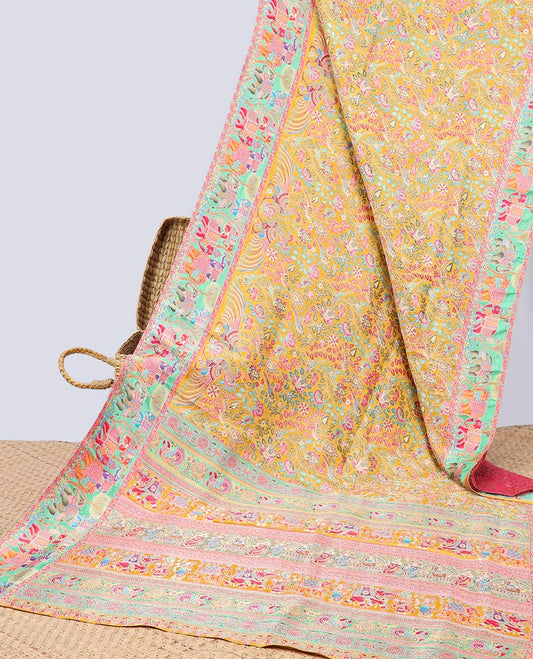 Yellow floral vine printed semi-banaras dola silksaree with contrast floral border & intricate animal motifs pallu