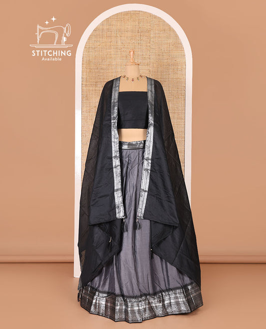 Grey taffeta silk half-saree, plain with a contrast traditional design bordered skirt, contrast blouse, and traditional zari bordered blouse