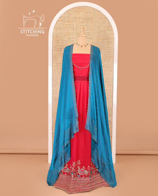 Red half-saree, Swarovski stone work with girl-on-the-horse motifs embroidered bordered satin georgette skirt, a matching satin georgette blouse, and a contrast Swarovski stone work scallop dhavani