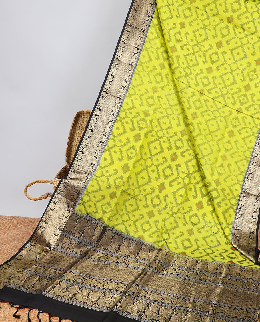 yellow ikkat style floral design soft silk saree with contrast zari border & traditional zari design pallu