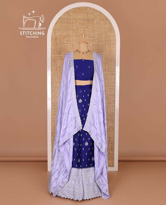 Blue half-saree, floral motifs embroidered semi-raw silk top, matching embroidered blouse, and contrast scallop embroidered georgette dhavani