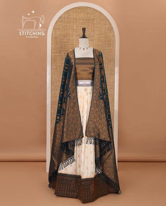 Cream semi-banaras half-saree, zari buttas & contrast Swarovski stonework traditional border skirt, jacquard blouse & contrast jaal jacquard peacock blue dhavani