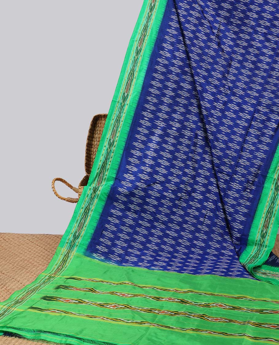Blue intricate design ikkat silk saree with contrast striped border & striped design pallu