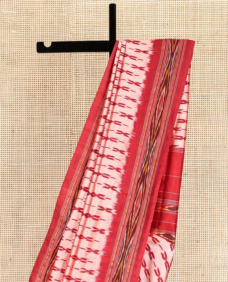 Peach Pochampally Ikat Silk Saree, Elevated with Cross-Shaped Buttas, Complemented by a Contrast Ikat Design Border, Ikat Pallu, and No Blouse