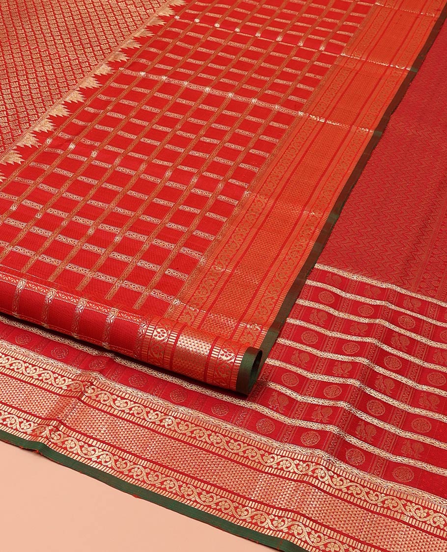 Red Kanchipuram Wedding Silk Saree, Delicately Woven with Jacquard Design on Its Body, Highlighted by Zari Border of Annam, Chakram, Neli, Muthu, Kodi Visiry, and Ara Maadam Designs, Grand Pallu of Vanki Designs, and Paired with a Contrast Blouse