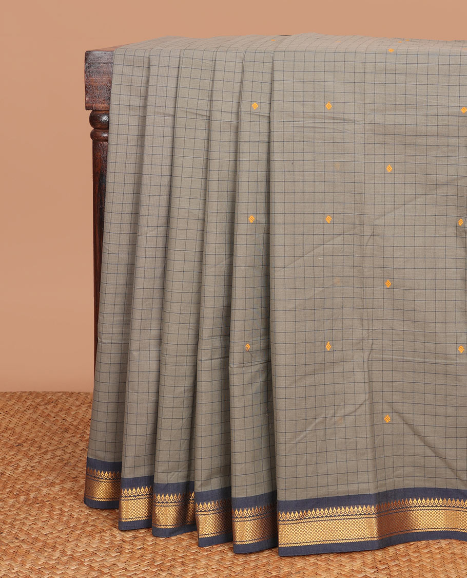 Grey checked Chettinad cotton saree with buttas, contrast traditional motif border & striped pallu