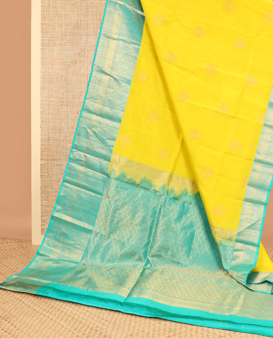 Yellow buttas silk saree with contrast zari design border & floral jaal design pallu