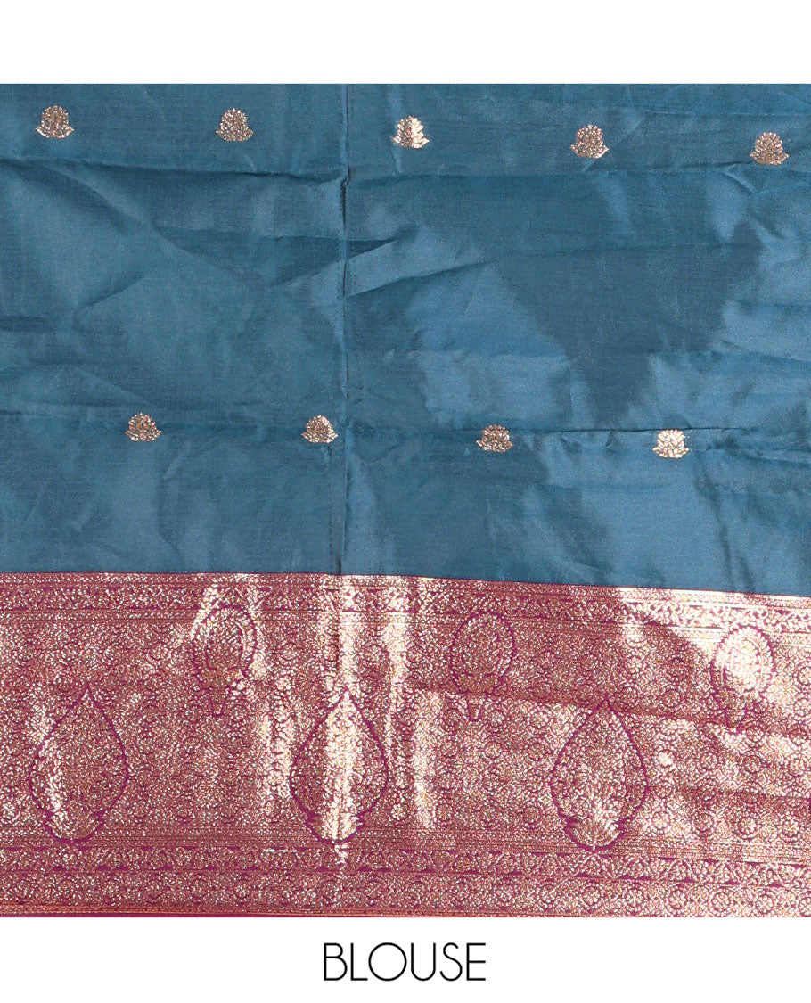 Peacock Blue and Magenta Semi-Banarasi Half-Saree, Accentulated with Zari Buttas on Its Skirt, Complemented by a Contrast Intricately Zari-Designed Border, Paired with a Matching Blouse, and a Contrast Satin Georgette Embroidered Scallop Dhavani