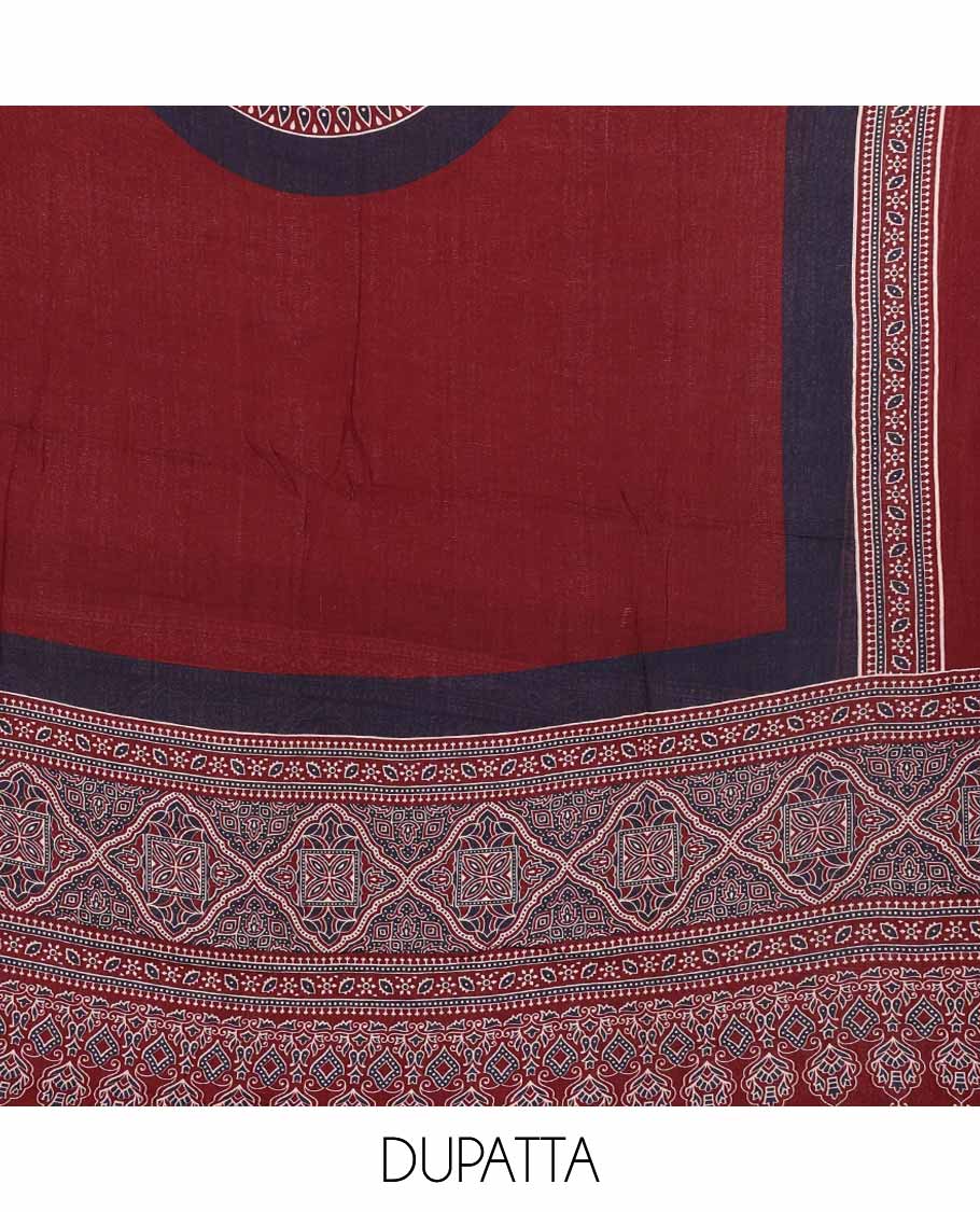 Maroon ajrak print rayon chudidhar material top with rayon material printed pant & mul mul votton ajrak printed dupatta