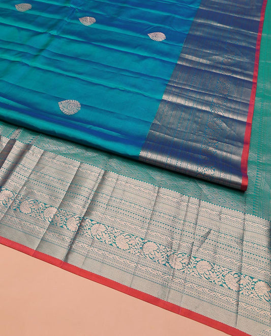 Blue Vasundhara Silk Saree, Accentuated with Zari Buttas on Its Body, Highlighted by a Zari Border of Rekku, Muthu, Diamond, and Kodi Visiry Designs, Grandly Woven Jaal Pallu, and Paired with a Matching Blouse