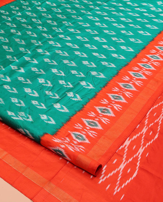 Green Ikkat Silk Saree, Accentuated with Ikkat Buttas All Over Its Body, Complemented by a Contrast Border of Ikkat Designs, Pallu of Butta Enclosed Jaal Designs, and Paired with a Contrast Blouse