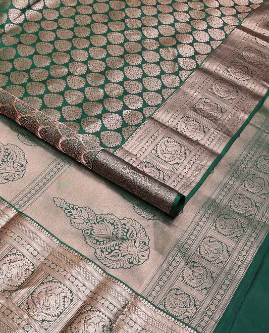 Green leaf buttas kancheepuram silk saree with self border of thilakam mokku, muthu, paun, mayil, kathir design & zari design pallu