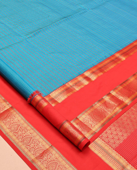 Blue Vasundhara Lite Silk Mix Saree, Elevated with Checks, a Contrast Rettai Pettu Border of Kamalam, Muthu, Kathir, and Manga Designs, Grand Pallu, and a Contrast Blouse