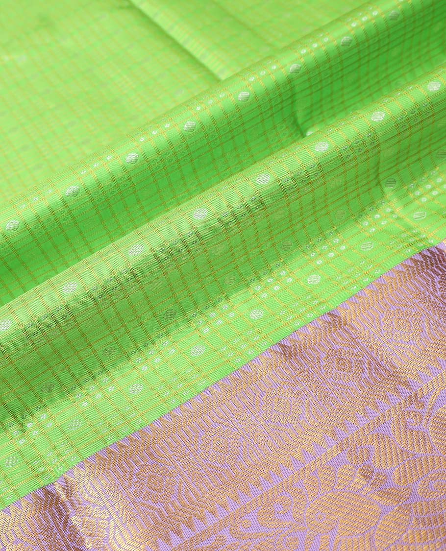 Green checked, floral design pure silk half silk saree with contrast zari border , contrast zari design blouse & plain with zari border dhavani