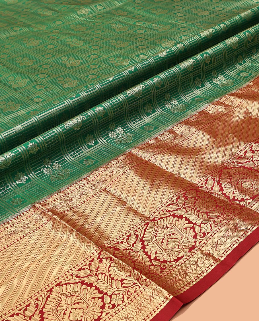 Green Art Silk Material Half Saree Set Featuring a Jacquard Skirt, a Contrast Traditional Zari Design Border, Contrast Blouse, and Zari Designs Dhavani