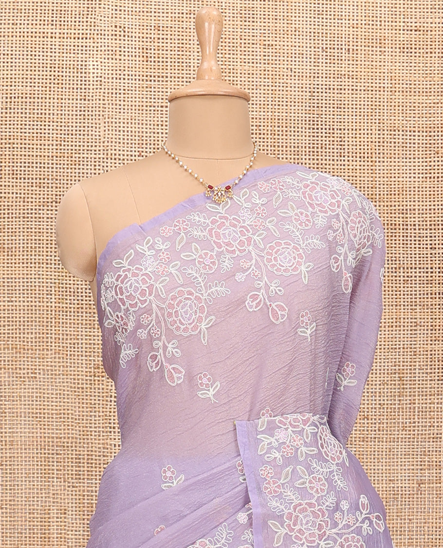 Lavender floral motifs thread embroidered tissue saree, floral vine embroidered border and pallu