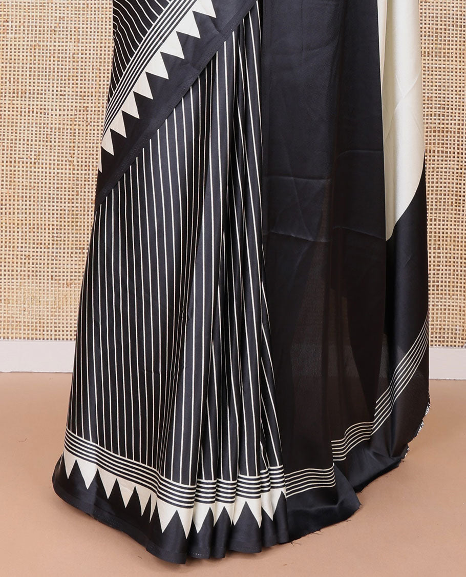 Black with white vertical lining printed design semi modal crepe saree with temple border & circle butta pallu along with printed blouse