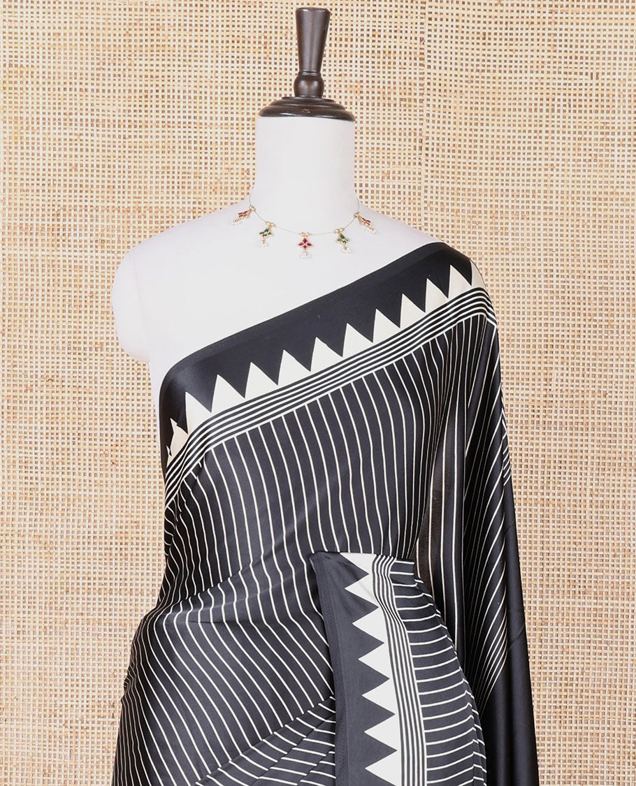 Black with white vertical lining printed design semi modal crepe saree with temple border & circle butta pallu along with printed blouse