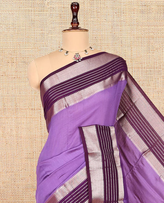 Violet Plain Assam Silk Saree, Complemented by a Contrast Traditional Zari Border, Zari-Striped Pallu, and a Contrast Blouse