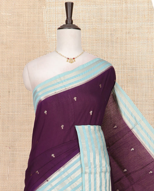 Purple Assam Silk Saree Prettified with Zari Buttas, Complemented by Contrast Zari Border Featuring Traditional Zari Designs, a Gleaming Pallu of Zari Stripes, and Paired with a Contrast Blouse