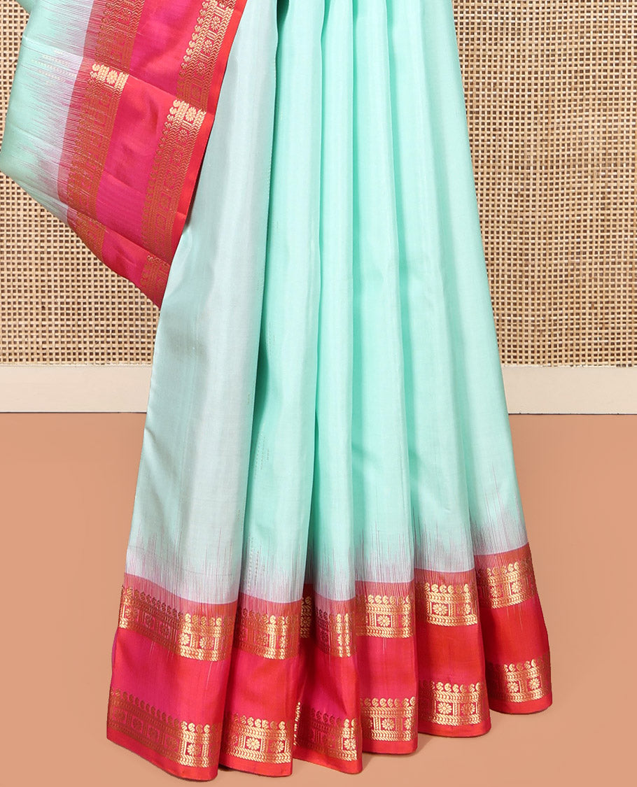 Light Turquoise Plain Kanchipuram Silk Saree, Complemented by a Contrast Rettai Pettu Border of Manga, Banaras, Muthu, and Kamalam, Vanki Pallu, and a Contrast Blouse