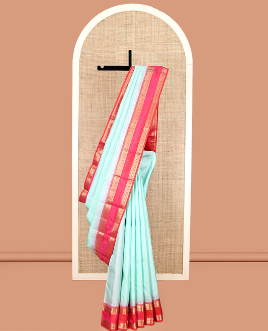 Light Turquoise Plain Kanchipuram Silk Saree, Complemented by a Contrast Rettai Pettu Border of Manga, Banaras, Muthu, and Kamalam, Vanki Pallu, and a Contrast Blouse