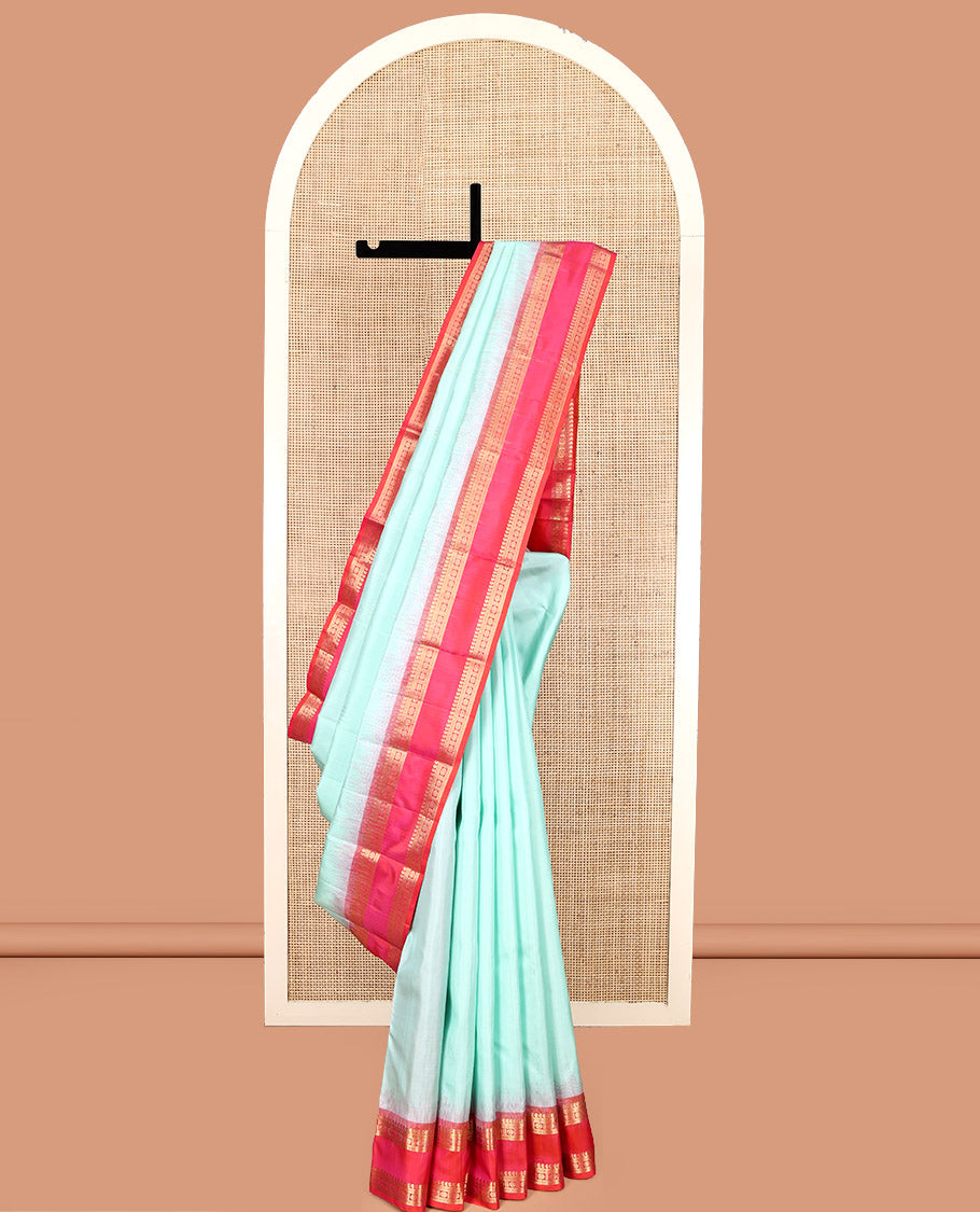 Light Turquoise Plain Kanchipuram Silk Saree, Complemented by a Contrast Rettai Pettu Border of Manga, Banaras, Muthu, and Kamalam, Vanki Pallu, and a Contrast Blouse