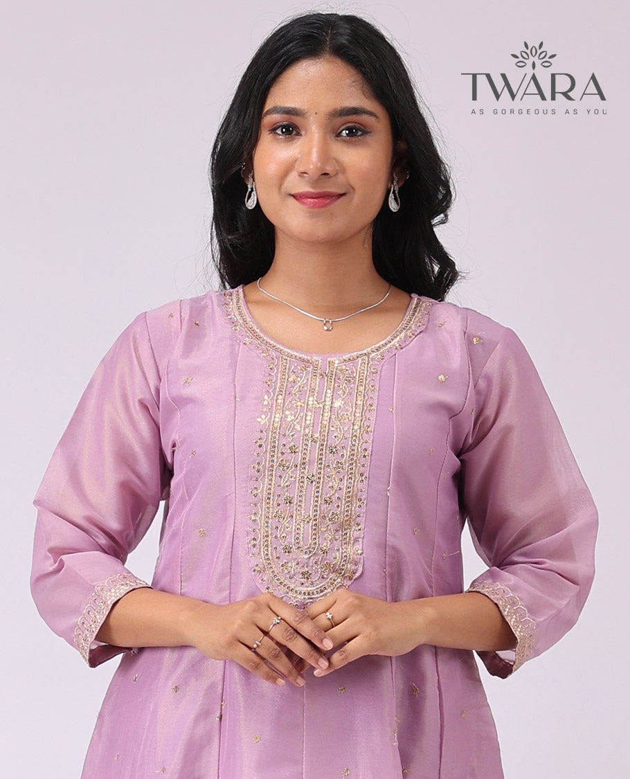 Twara lavender floral embroidered round neck , 3/4 th sleeve , bleow knee lenght a - line kuti with straight pants