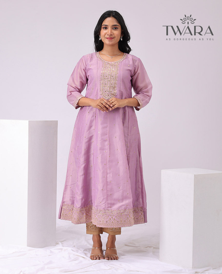 Twara lavender floral embroidered round neck , 3/4 th sleeve , bleow knee lenght a - line kuti with straight pants