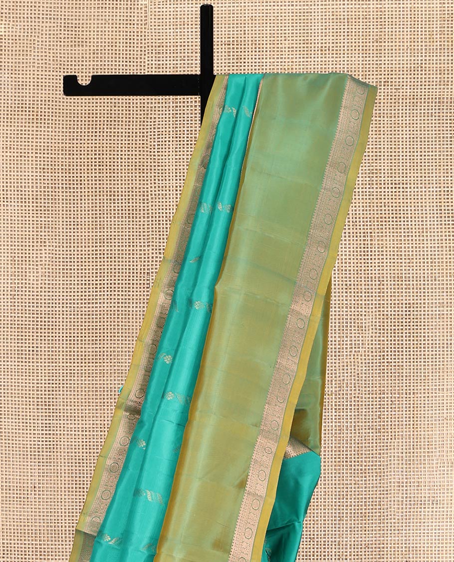 Green Uppada Silk Saree, Enriched with Zari Buttas, Complemented by a Contrast Traditional Zari Border, Grand Pallu, and a Contrast Blouse