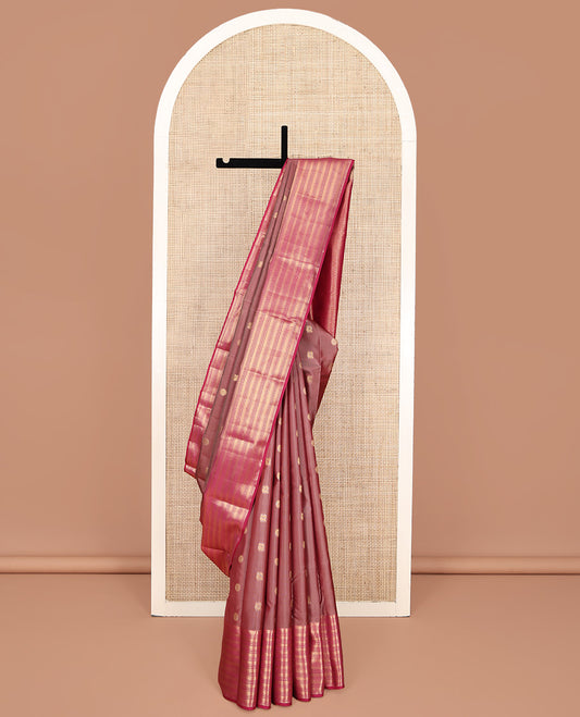 Brown Vasundhara Silk Mix Saree, Enriched with Mayil and Chakram Buttas All Over Its Body, Complemented by Contrast Geometric Patterned Border, Grandly Decked Up Pallu and Paired with a Contrast Blouse