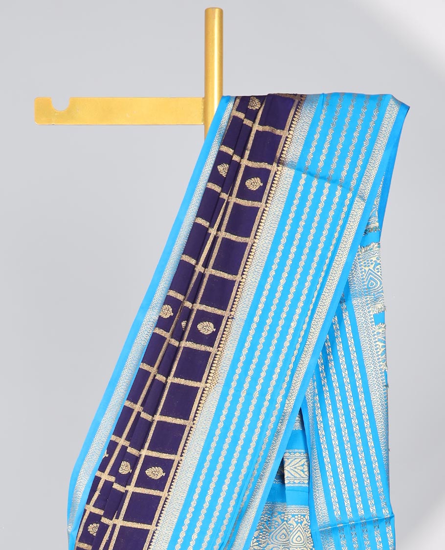 Violet floral motifs enclosed with checked mysore silk saree with contrast striped zari border & pallu of intricate design