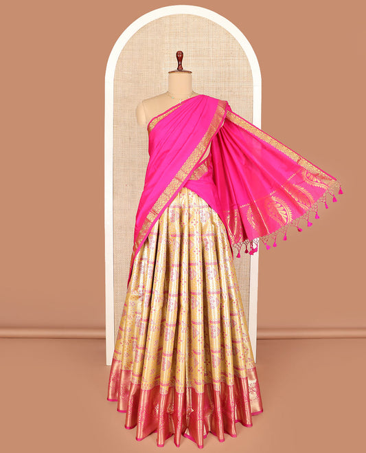 Yellow jacquard art silk half-saree, contrast traditional zari bordered skirt, contrast jacquard blouse, and a contrast paisleys motifs woven dhavani