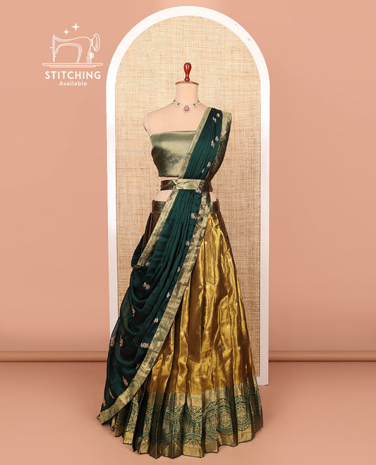 Gold-dark green zari buttas half-saree with contrast intricate Mughal motifs woven bordered skirt, brocade blouse, and a zari design dhavani