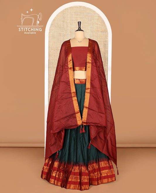 Dark Green Art Silk Half-Saree Featuring Plain Skirt, Complemented by Contrast Temple Traditional Zari Design Varisai Pettu Border, Paired with a Contrast Blouse, Contrast Zari-Bordered Dhavani, and Brocade Belt