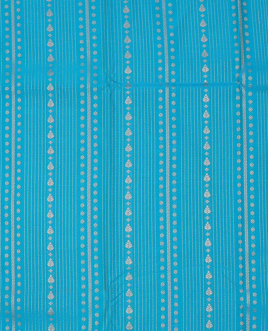 Blue art silk pavadai material, zari design with contrast traditional zari border skirt, a contrast bordered blouse