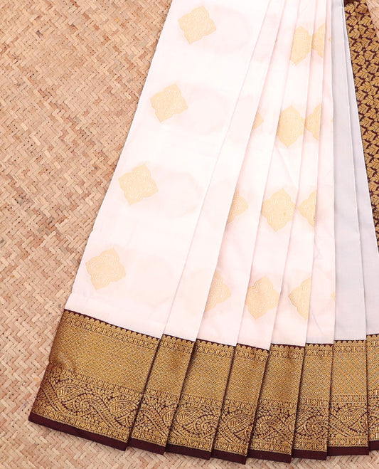 White Budget Silk Saree, Elevated with Buttas All Over Its Body, Complemented by a Contrast Traditional Zari Design Border, Intricately Designed Pallu, and Paired with a Contrast Blouse