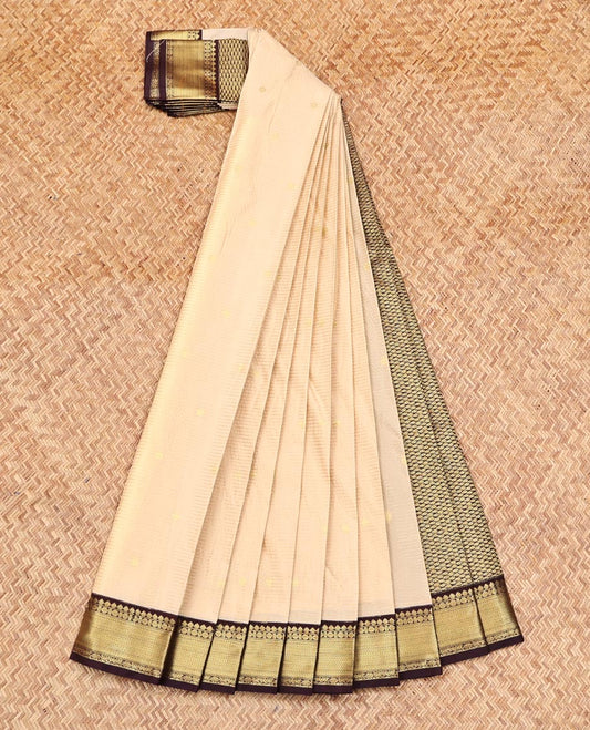 Sandal Budget Silk Saree, Sparsely Threaded with Buttas and Stripes on Its Body, Complemented by a Contrast Traditional Zari Design Border, Intricately Designed Pallu, and Paired with a Contrast Blouse